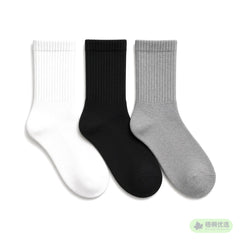 Three pairs of white, black and grey cotton crew socks