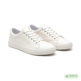 Pair of off-white low-top canvas sneakers with white rubber soles