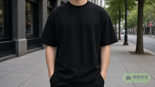Black oversized tee worn with cargo pants on a city street